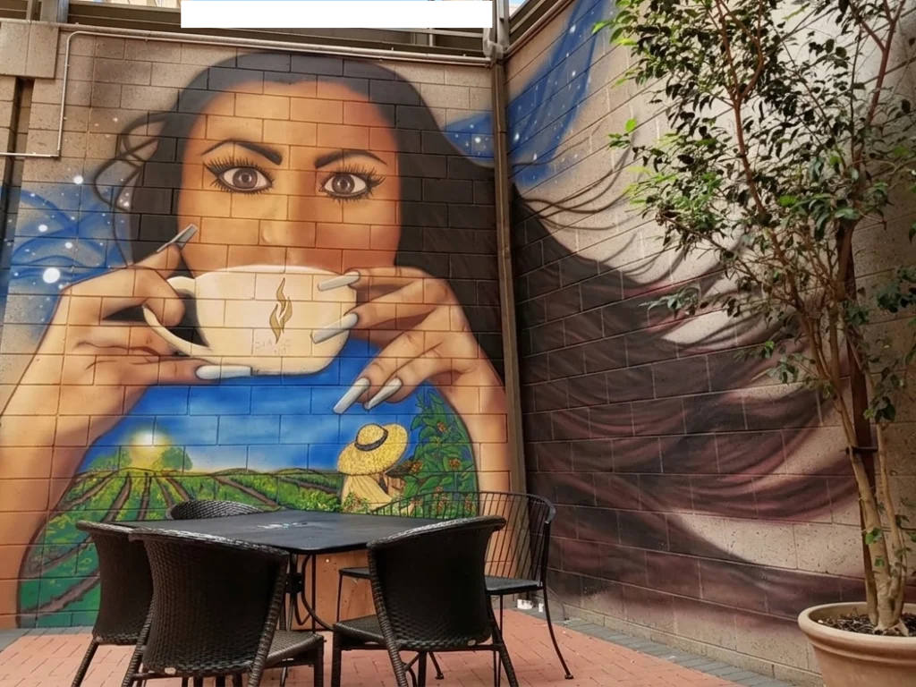 Fair Trade Cafe Mural of Fair Trade Cafe owner Stephanie Vasquez