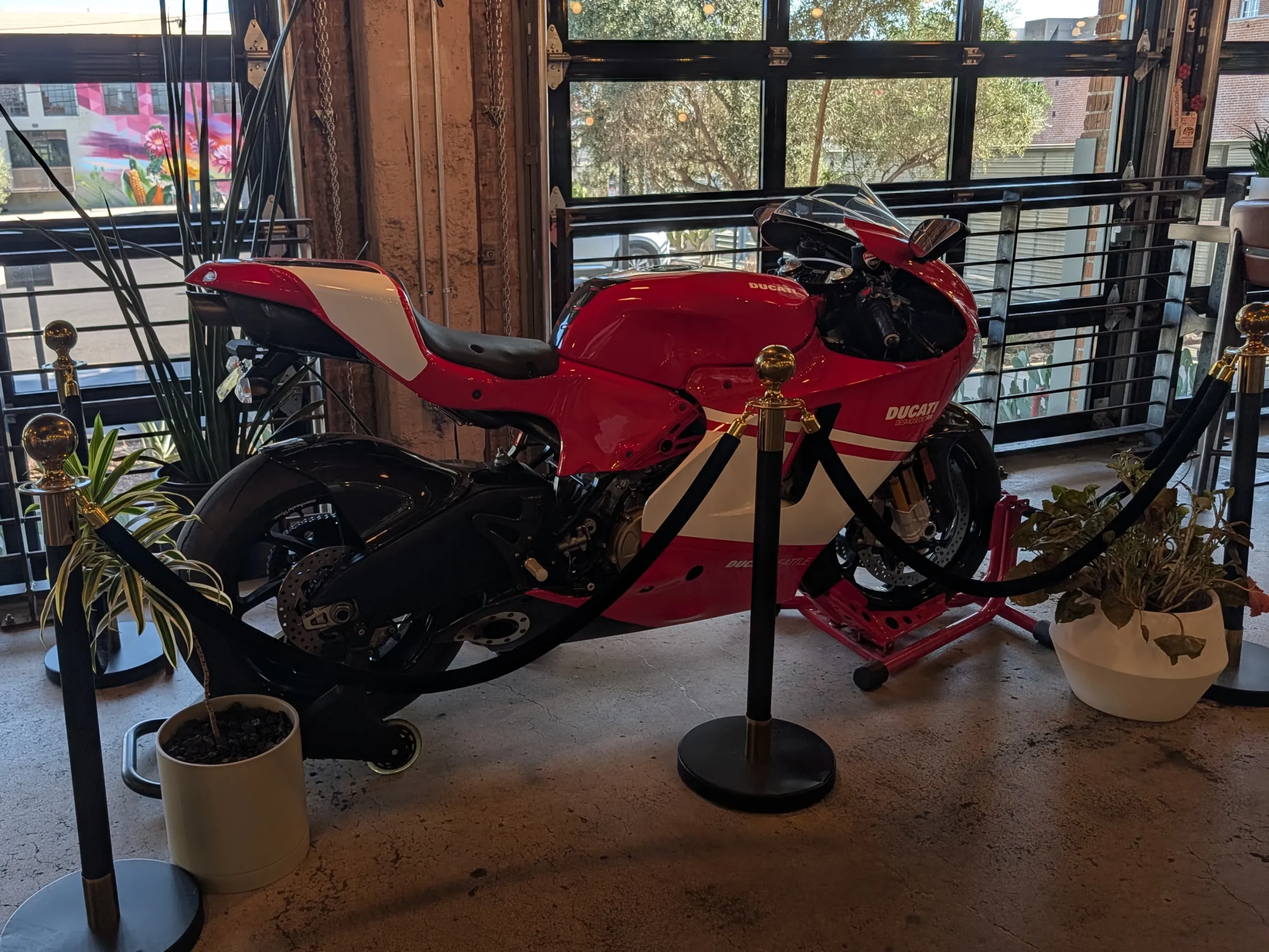 CoffeeDrunk - Image shows a real Ducati Desmosedici RR Motorcycle Inside the coffee shop