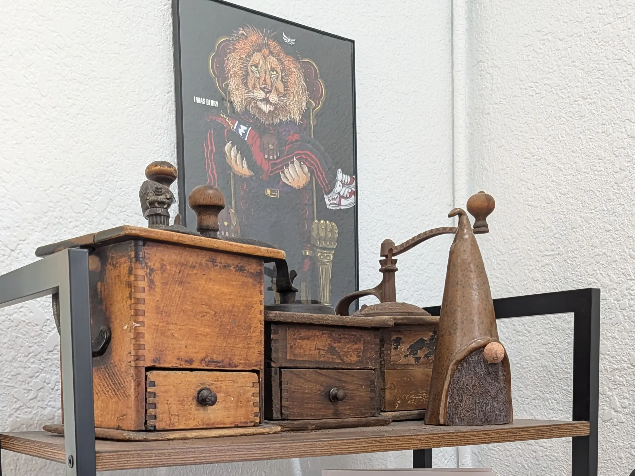 Homage Coffee House - Old Grinders sit on the Shelf