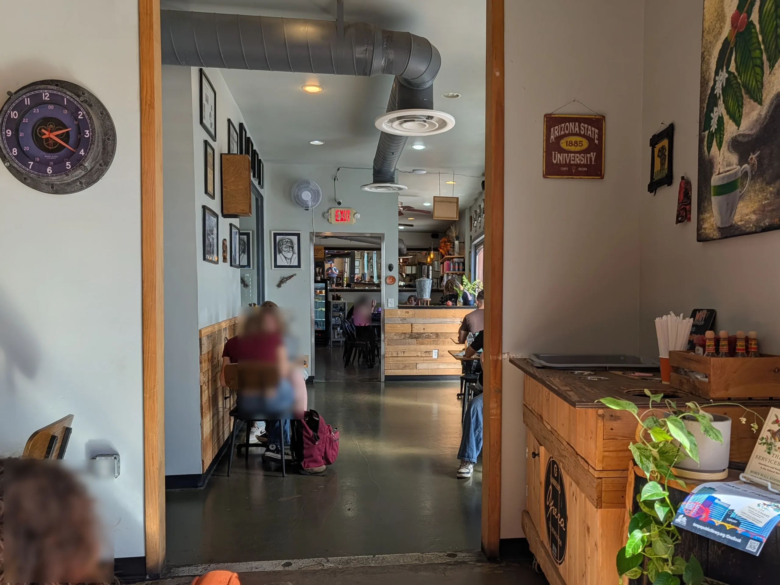 Infusion Coffee and Tea Crafters in Tempe AZ. Image shows multi-room layout and indoor seating